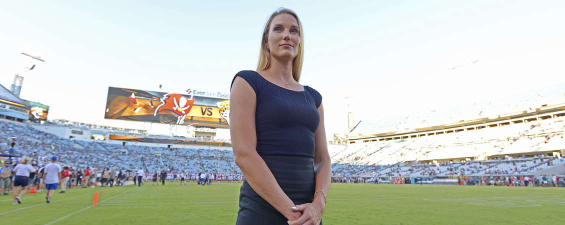 Kristen Grohs standing on the Jacksonville Jaguars stadium field