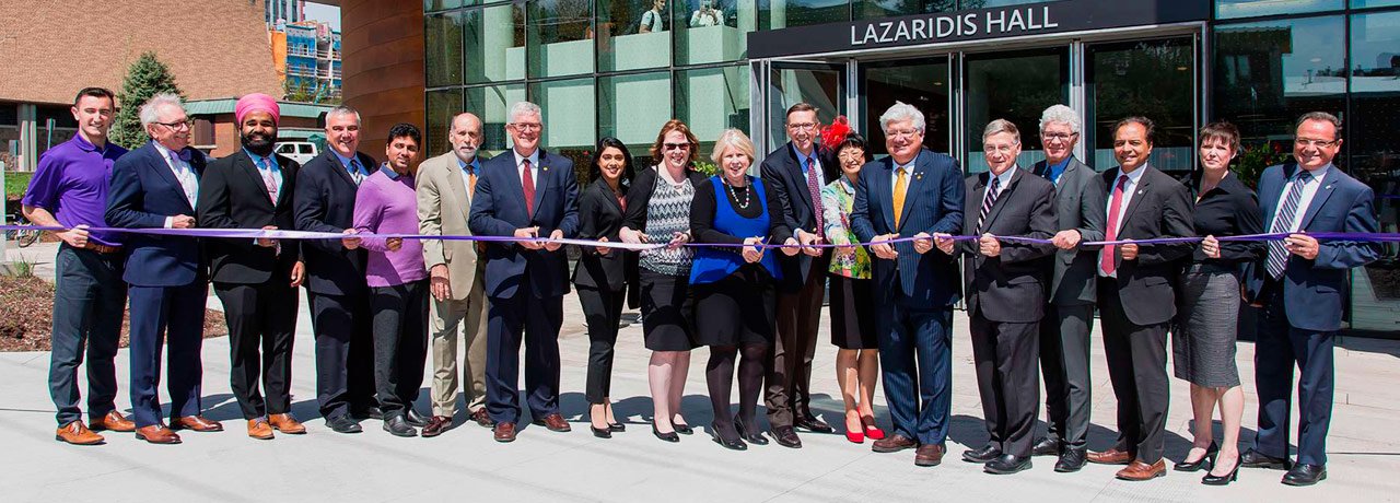 laurier faculty, staff and donors participate in ribbon cutting outside Lazaridis Hall