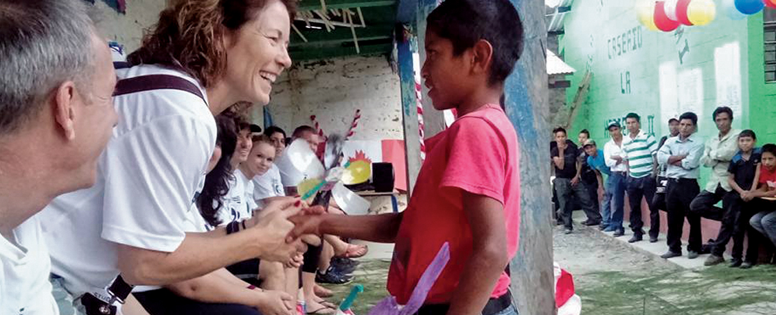 volunteers engage with children in a village in Nicaragua